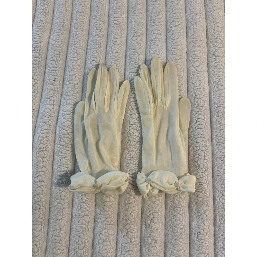 Vintage woman’s gloves 1960’s white stretch Bows at wrist